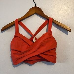 Cross cross burnt orange sports bra